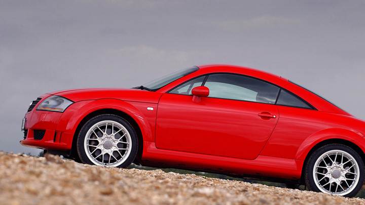 Side Pose Of 2003 Audi TT Coupe In Red